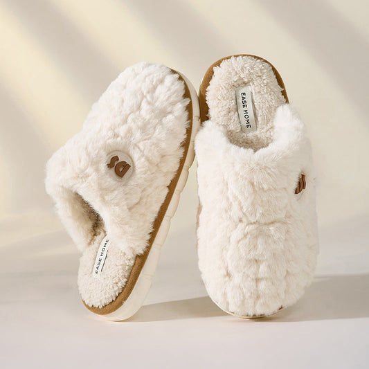 Women's and men's indoor winter slippers with plush upper material, thick eva sole, non-slip grip, and synthetic wool lining - ideal as house slippers